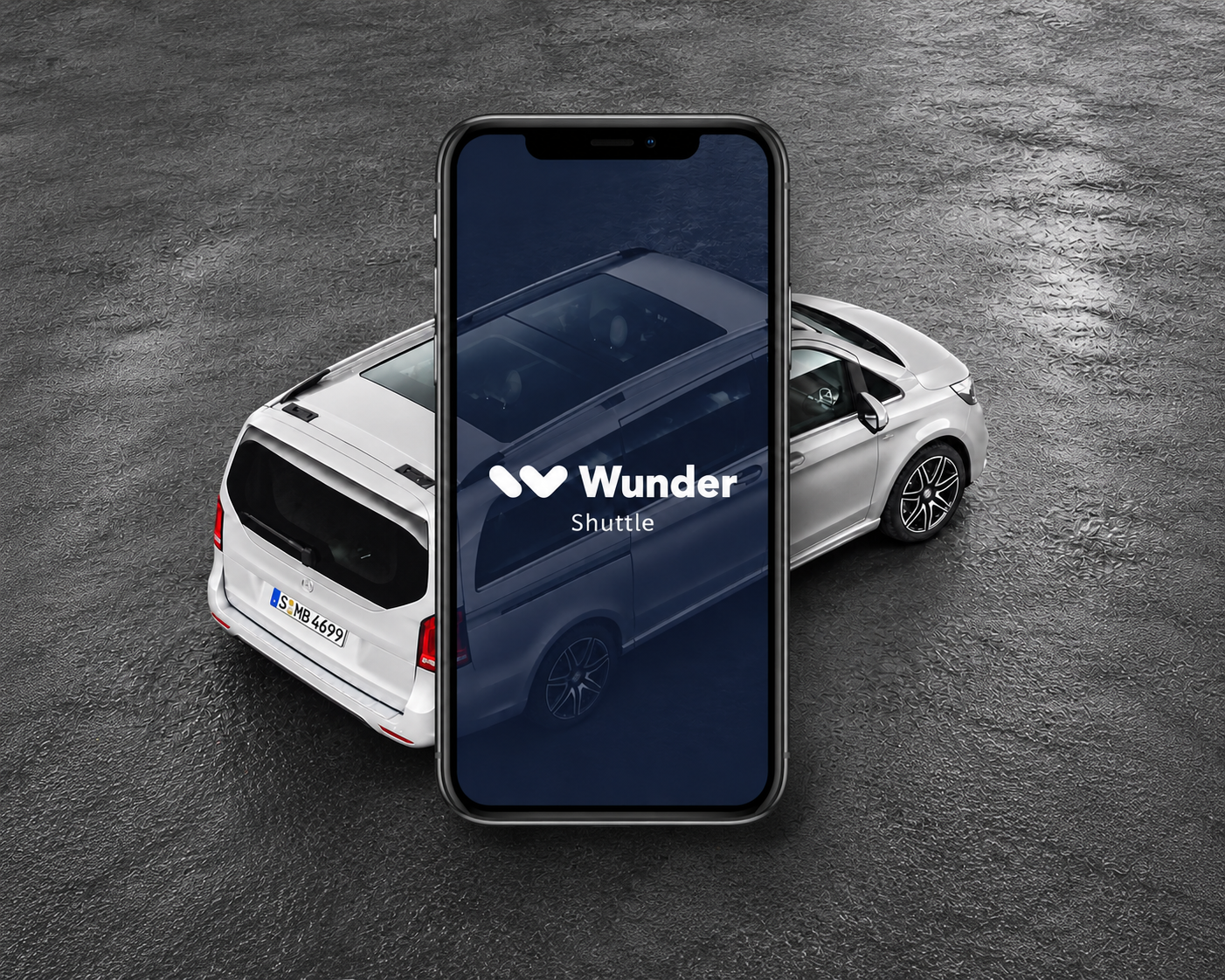 Wunder Shuttle app shown on a phone in front of a vehicle